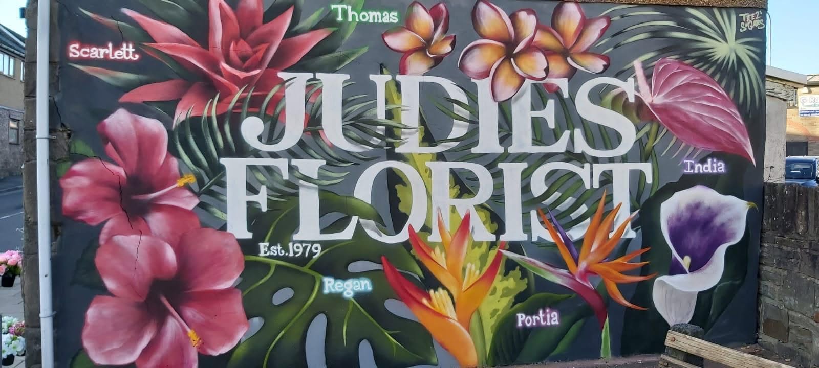 The colourful Judies Florist mural painted on the shop wall, Est. 1979